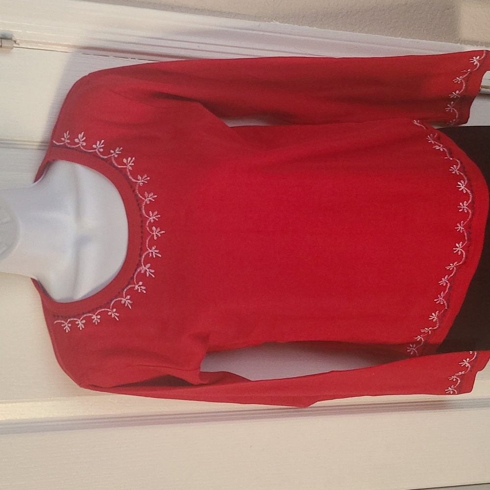 Red blouse with embroidery